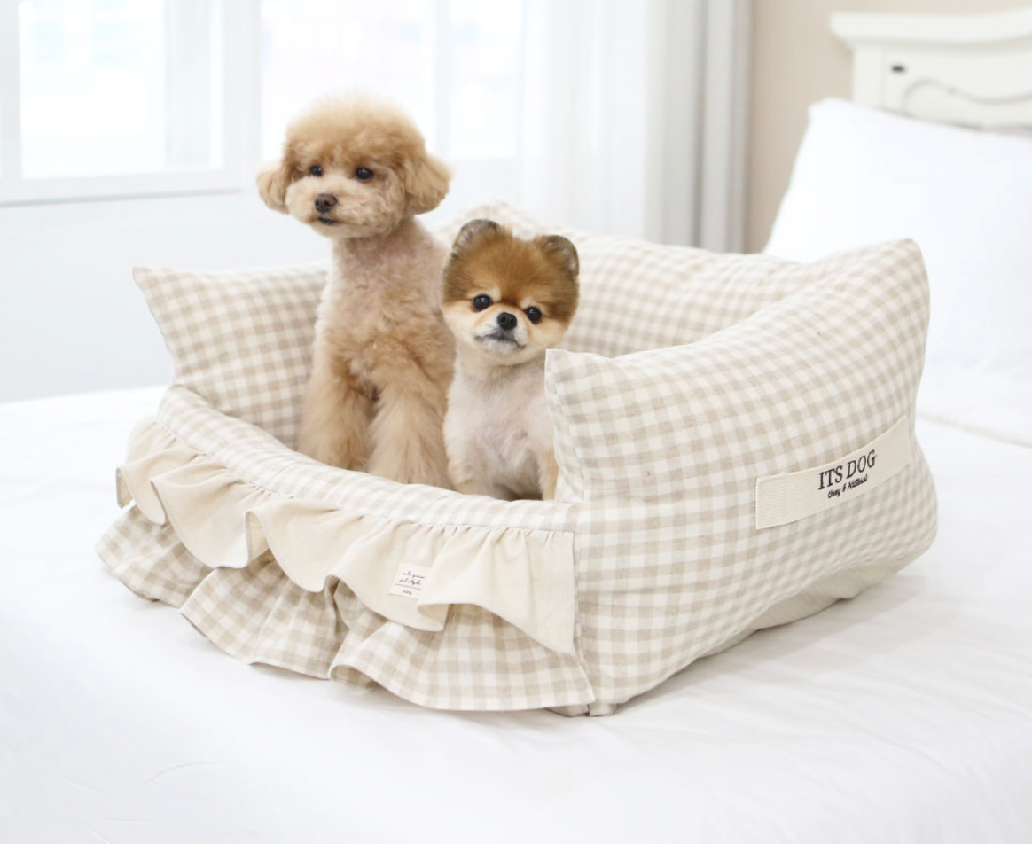 Its dog bed- beige- M